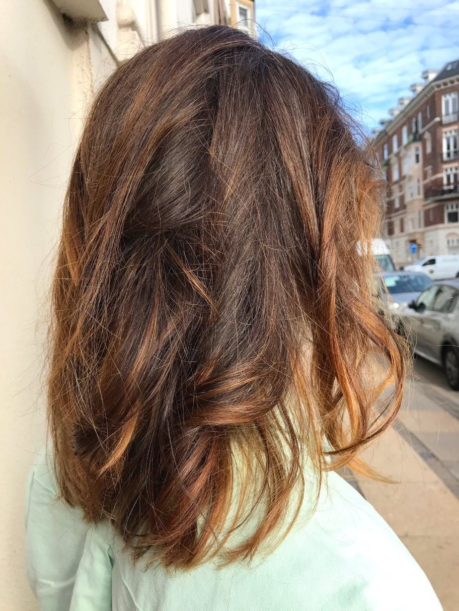 Sun-kissed Shatush colour in copper and caramel on a layered haircut, hair salon in Copenhagen V